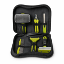 Six-piece lime-green pet grooming kit arranged inside an open black carry case
