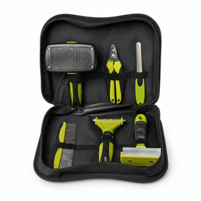 Six-piece lime-green pet grooming kit arranged inside an open black carry case